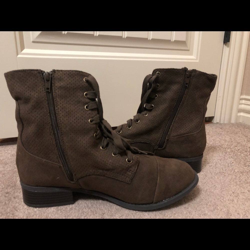 Brown lace up boots with zipper on the inside